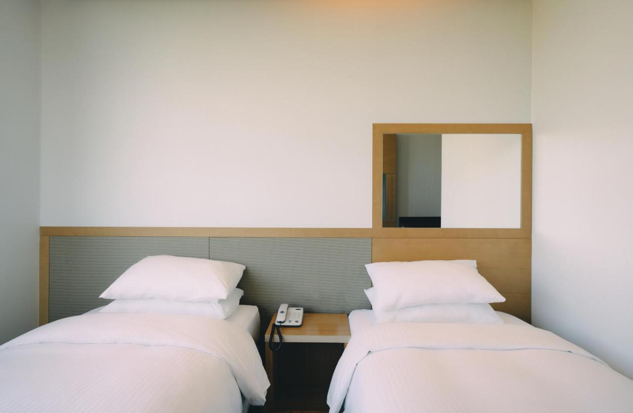 Jeju Poong Gyung Hotel Seogwipo Exterior foto
